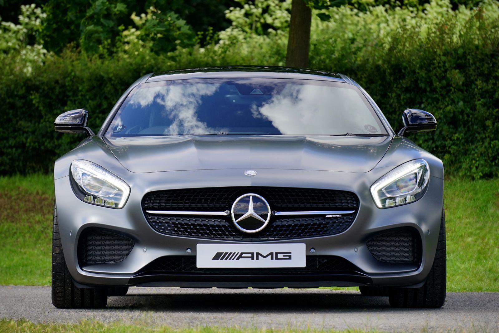 Matte grey Mercedes-AMG GT front view with LED headlights