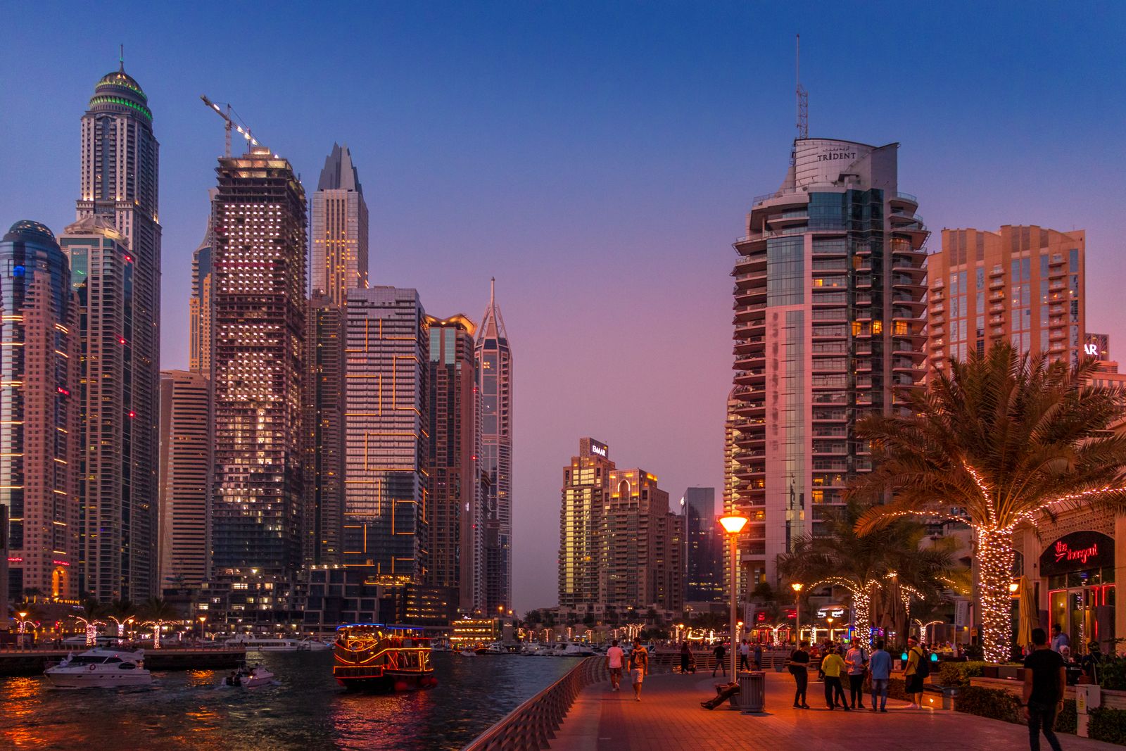 Dubai Marina promenade at dusk, near the studio's Dubai office