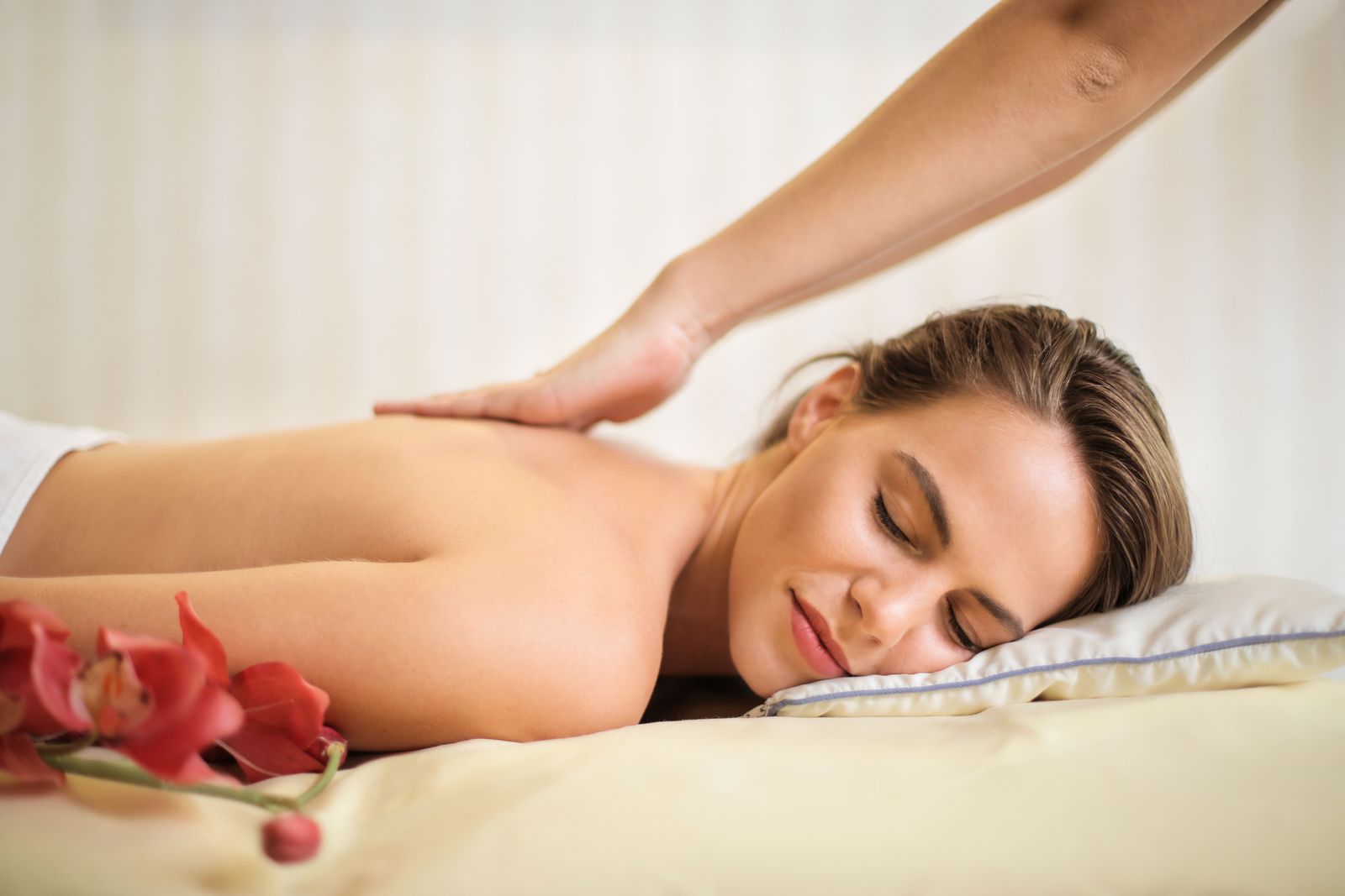 Client resting during a slow massage ritual at VELA